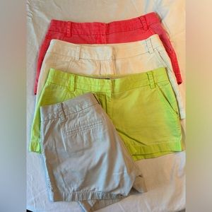Complete set! Four pairs J.Crew classic 4”chino shorts in size 4.